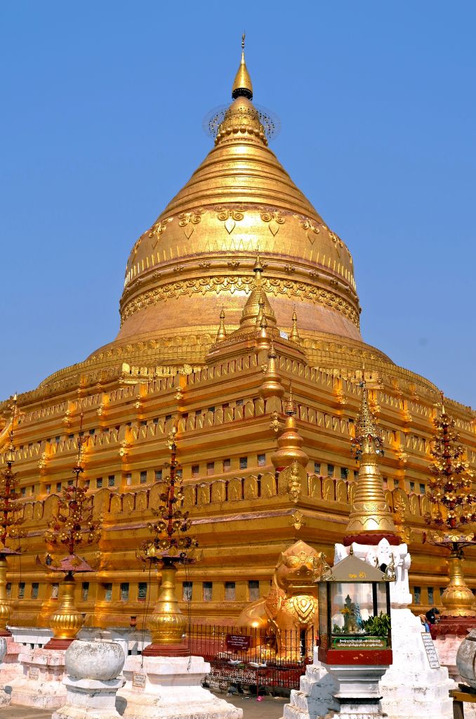 The gold base, stupa and surrounding decorative elements of the Shwezigon Pagoda in Bagan, Myanmar