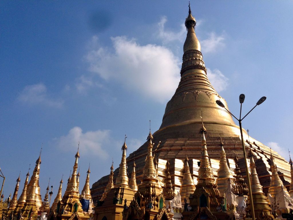 Shwedagon Pagoda in Yangon, Myanmar and its stupas against the sky