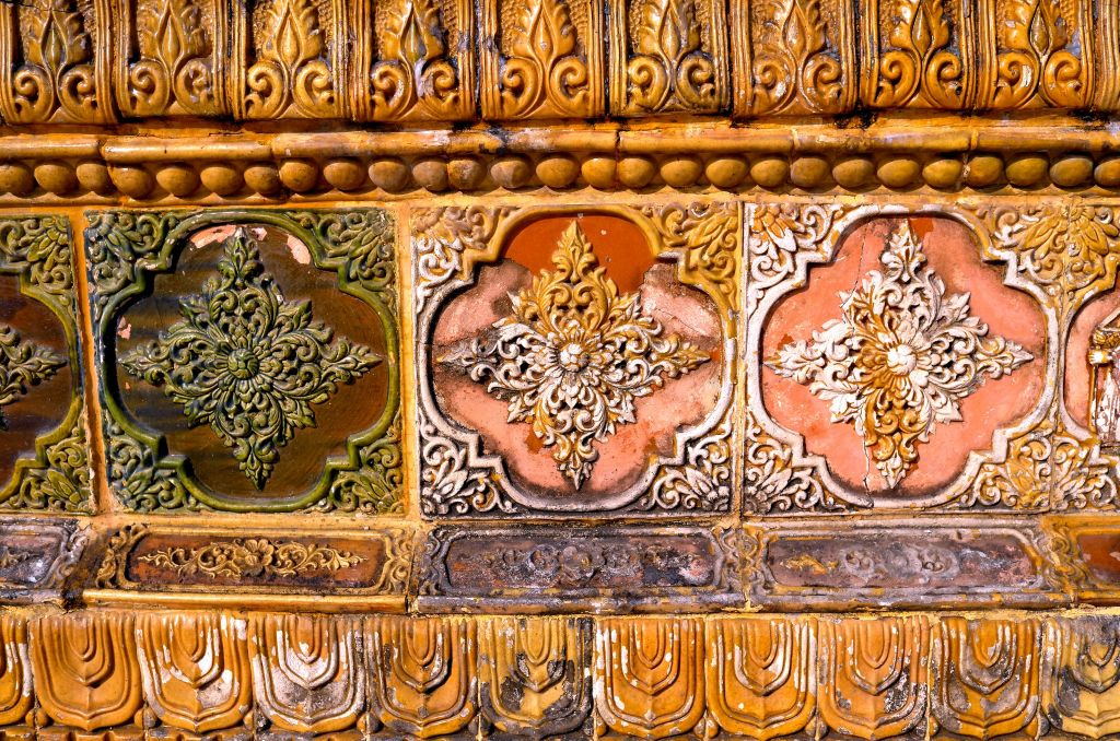 Ornate floral tiles at Shwedagon Pagoda in Yangon, Myanmar
